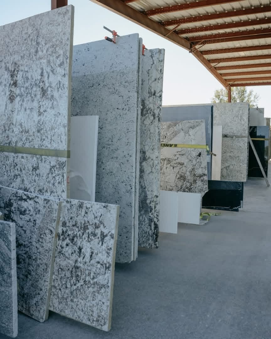 Granite slabs standing in the slab yard